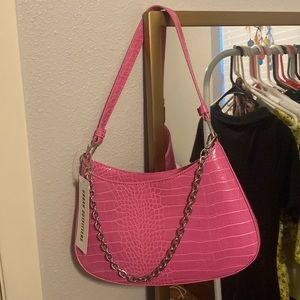 Urban outfitters mini shoulder bag in pink w/chain.